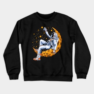 Astronaut sitting on the crescent moon Crewneck Sweatshirt